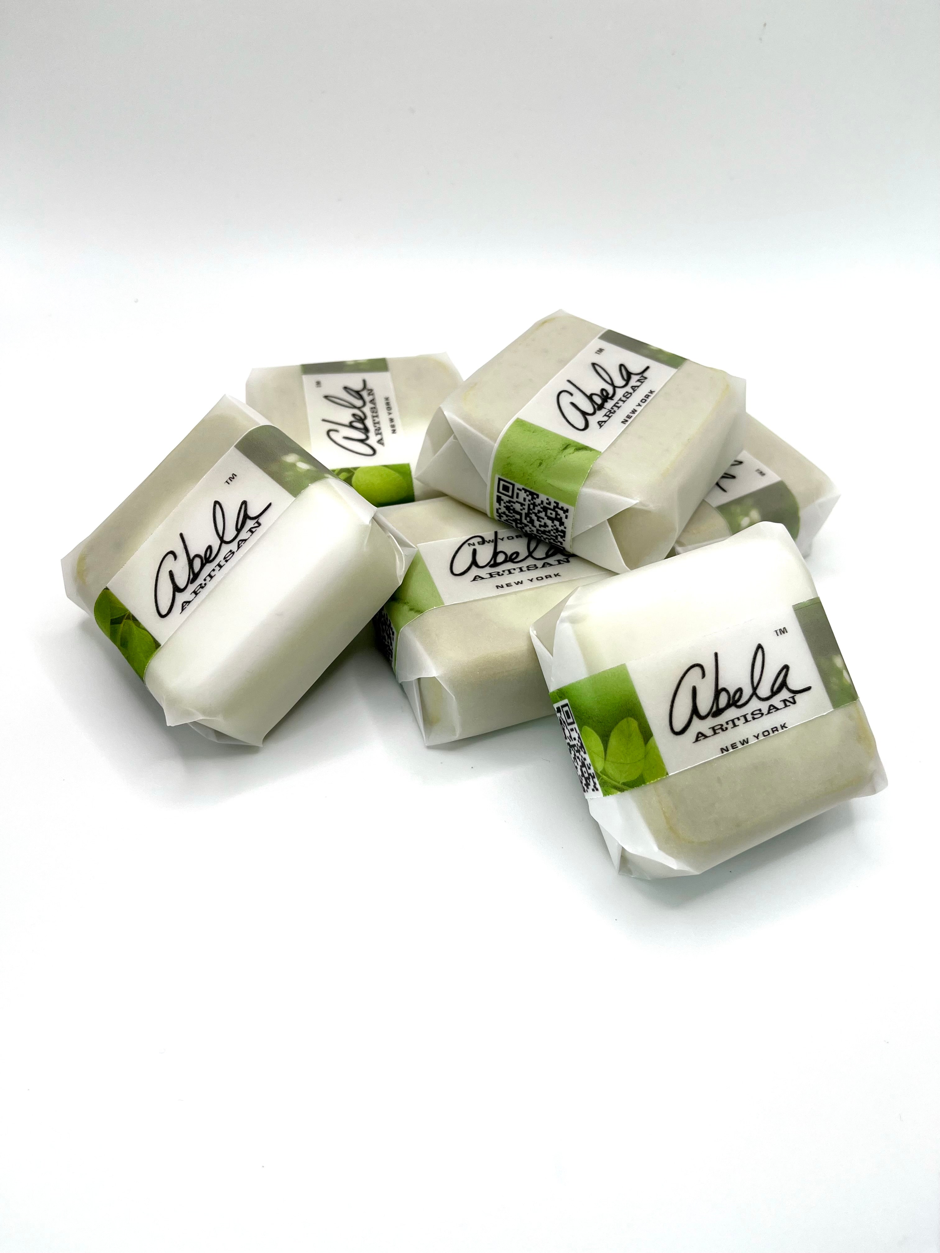 Abela Artisan “MINI LUXE MORINGA CLAY-TEA TREE” Wellness Soap 2”x2”, 3oz- 84g.